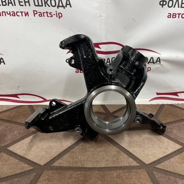 Поворотный кулак левый Polo Rapid Fabia