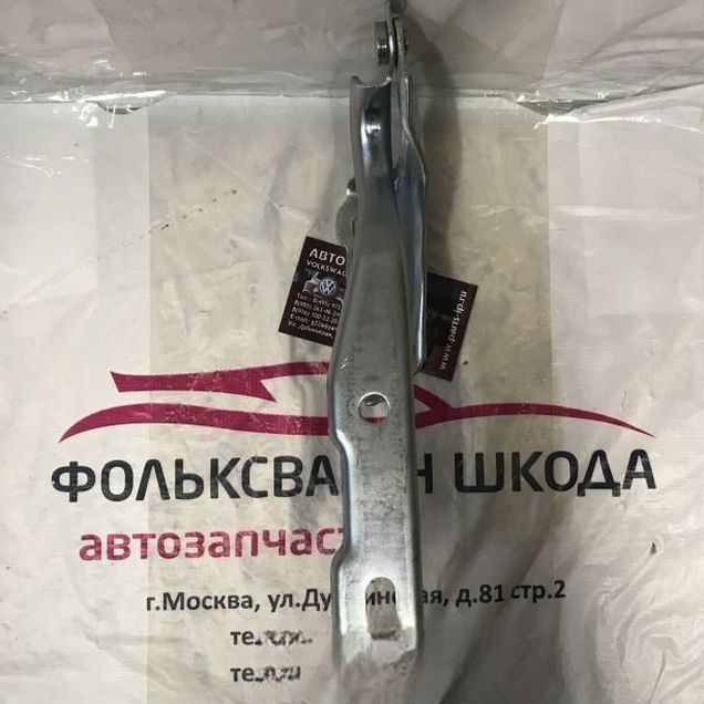 Петля капота левая Шкода Рапид
