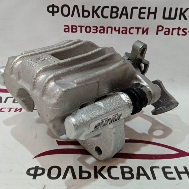 Суппорт задний левый Volkswagen Skoda