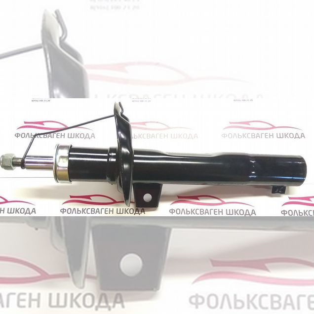 Амортизатор передней подвески Фольксваген Шкода