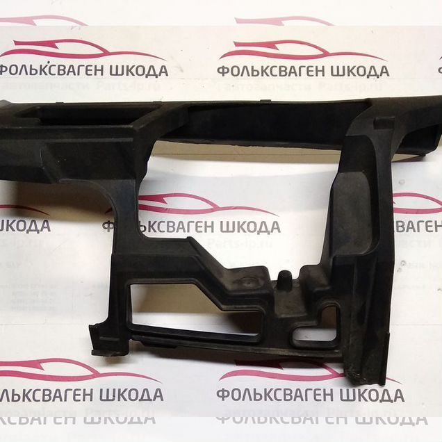 Кронштейн цилиндра омывателя фары левый Golf 6