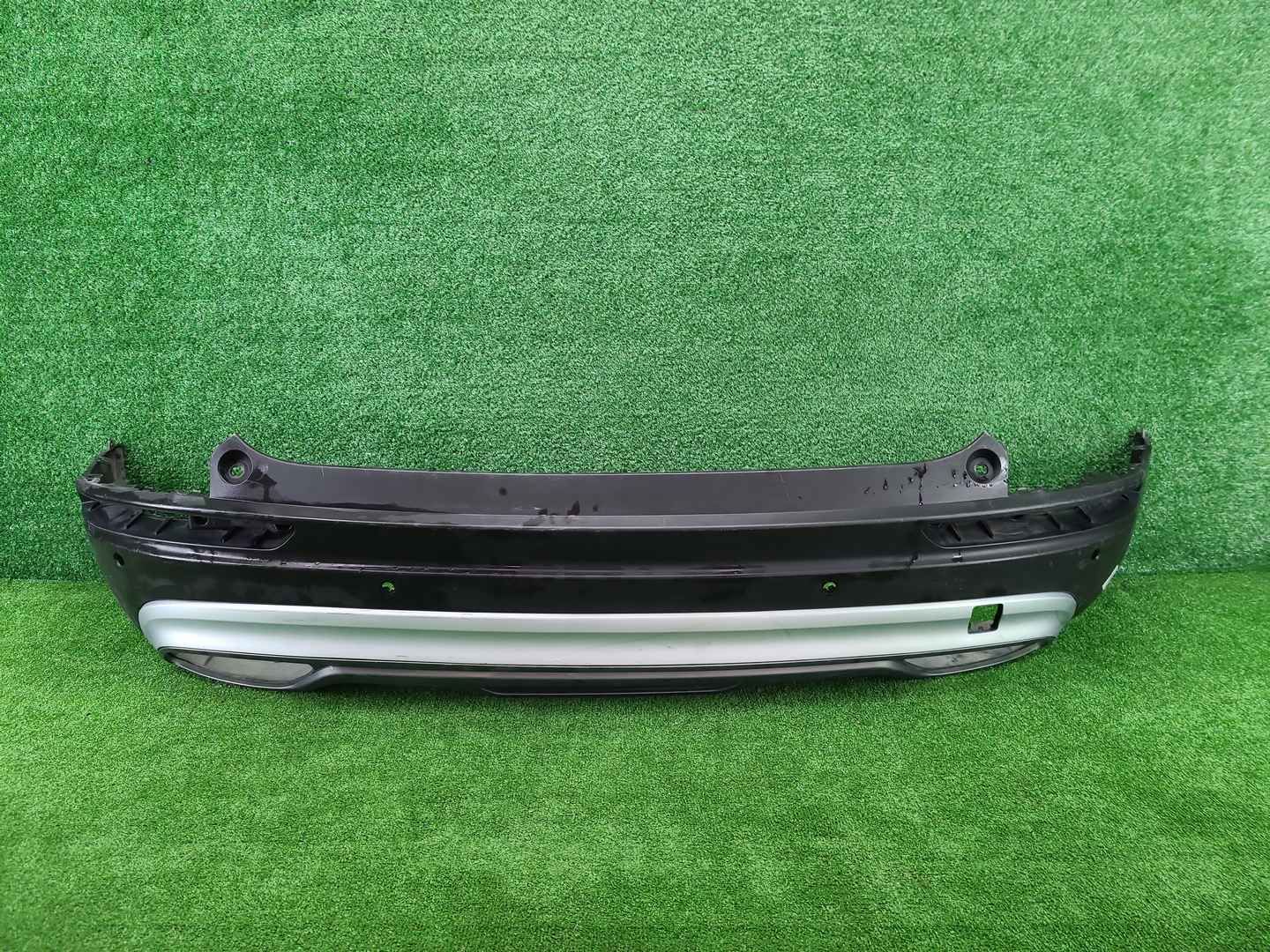 Бампер задний Geely Atlas Pro (2021-2025)