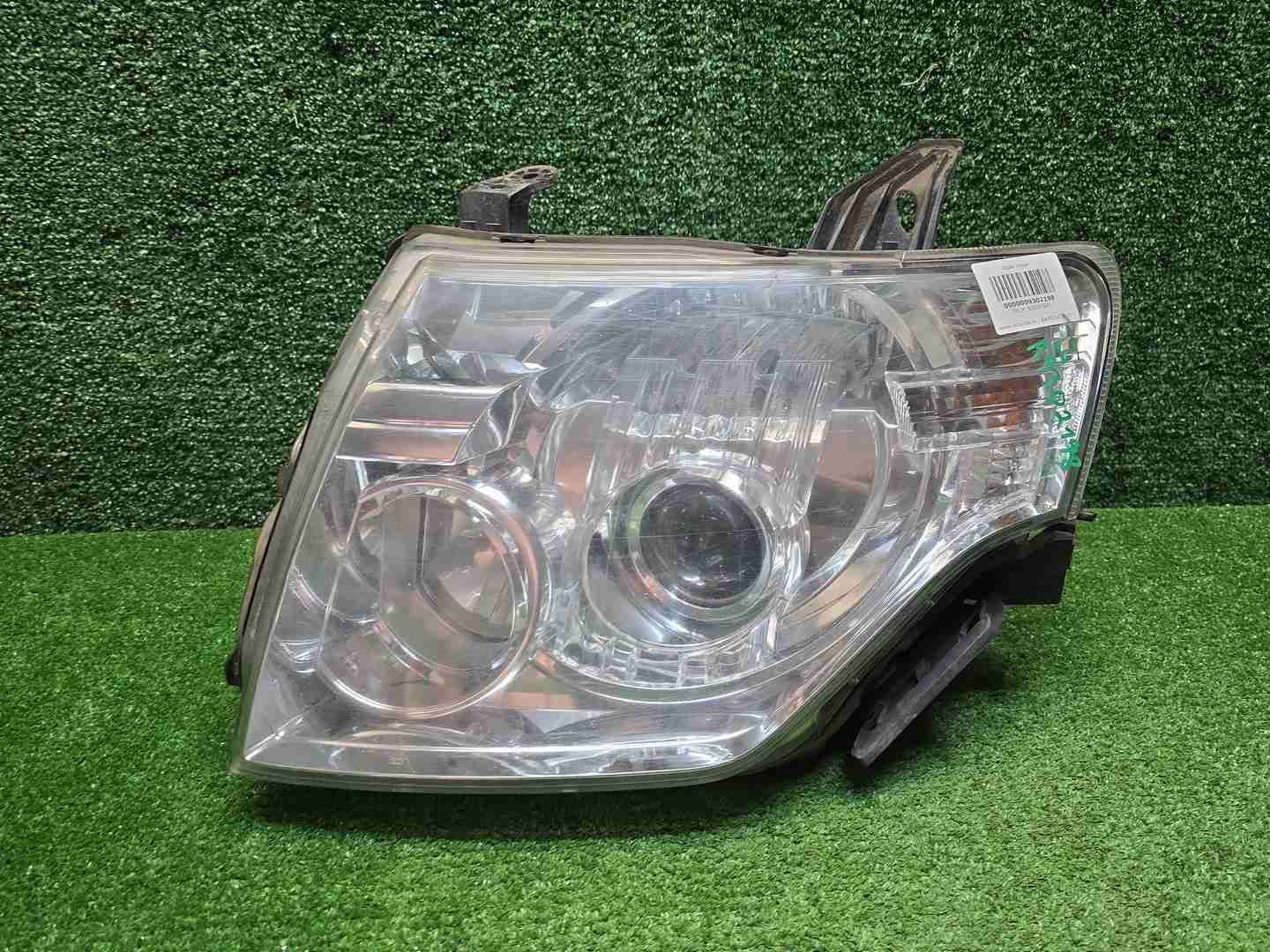 Фара левая Mitsubishi Pajero 4 (2006-2014) ксенон