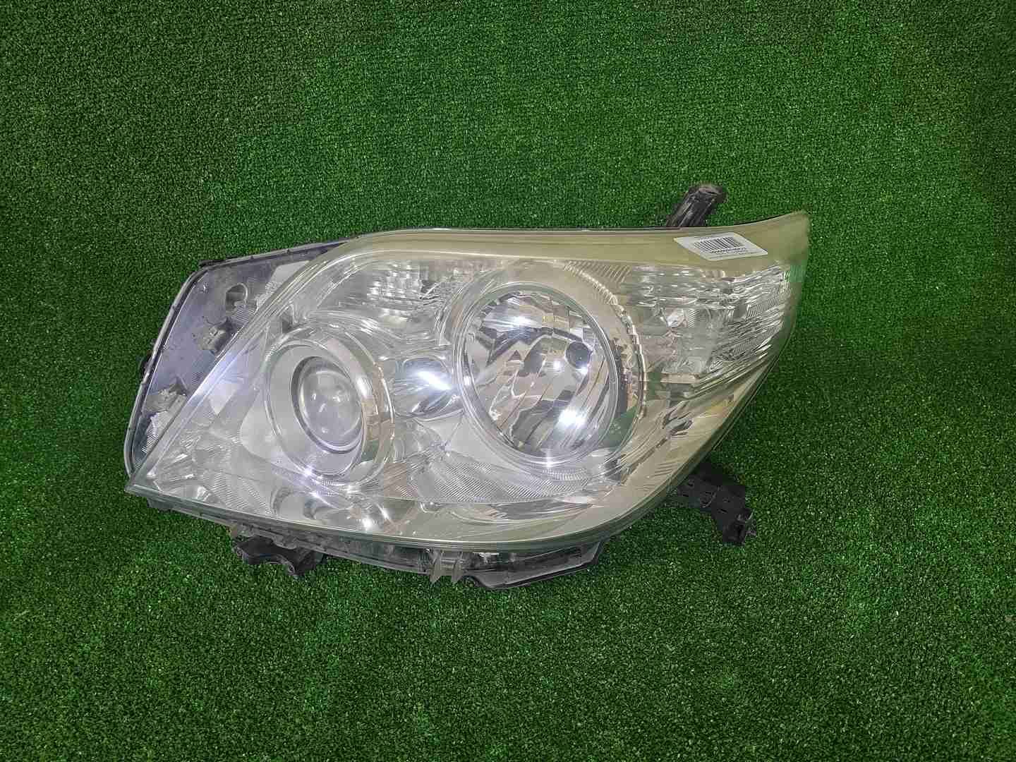 Фара левая Toyota LC Prado 150 (2009-2013) галоген