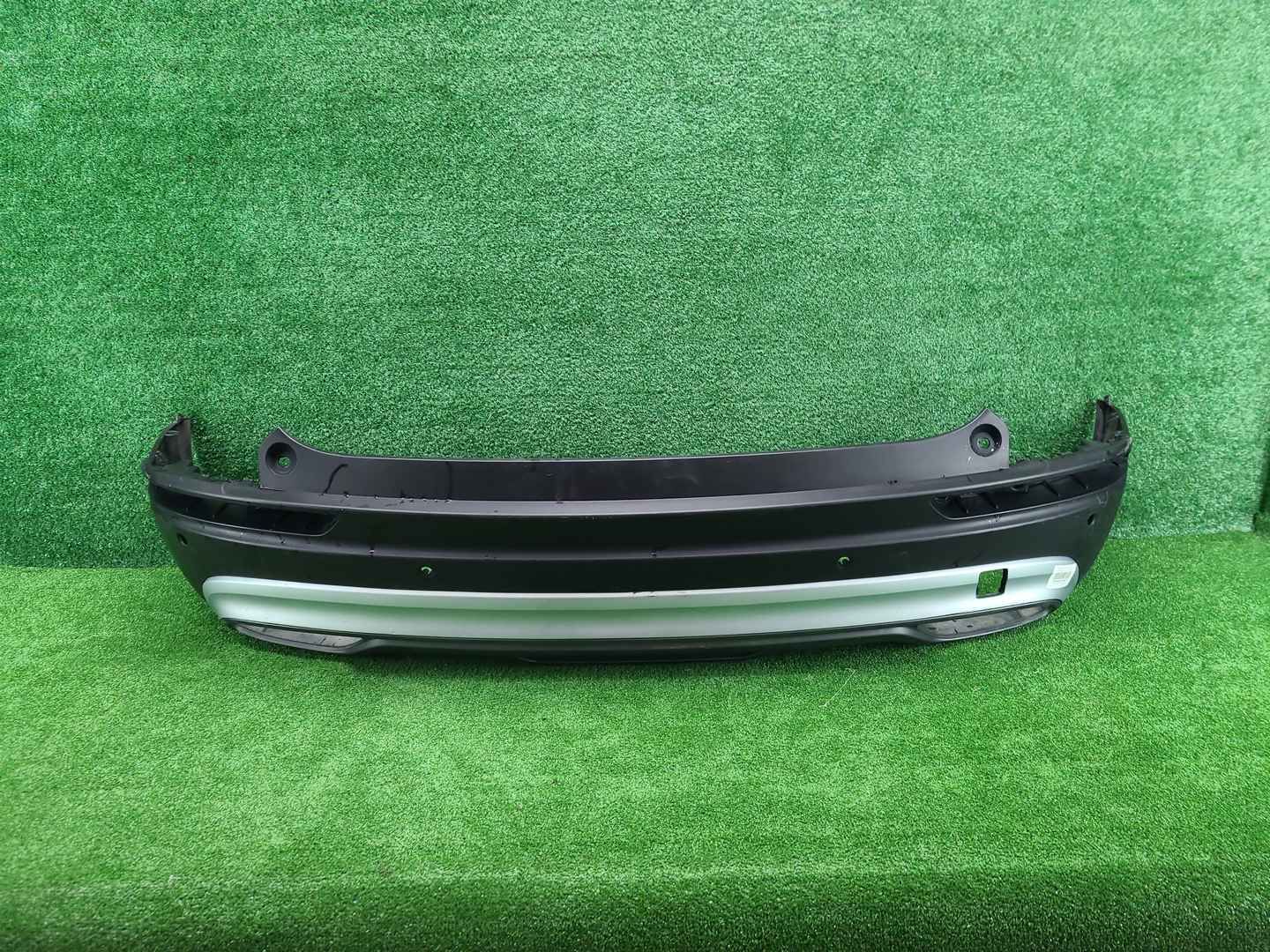 Бампер задний Geely Atlas Pro (2021-2025)
