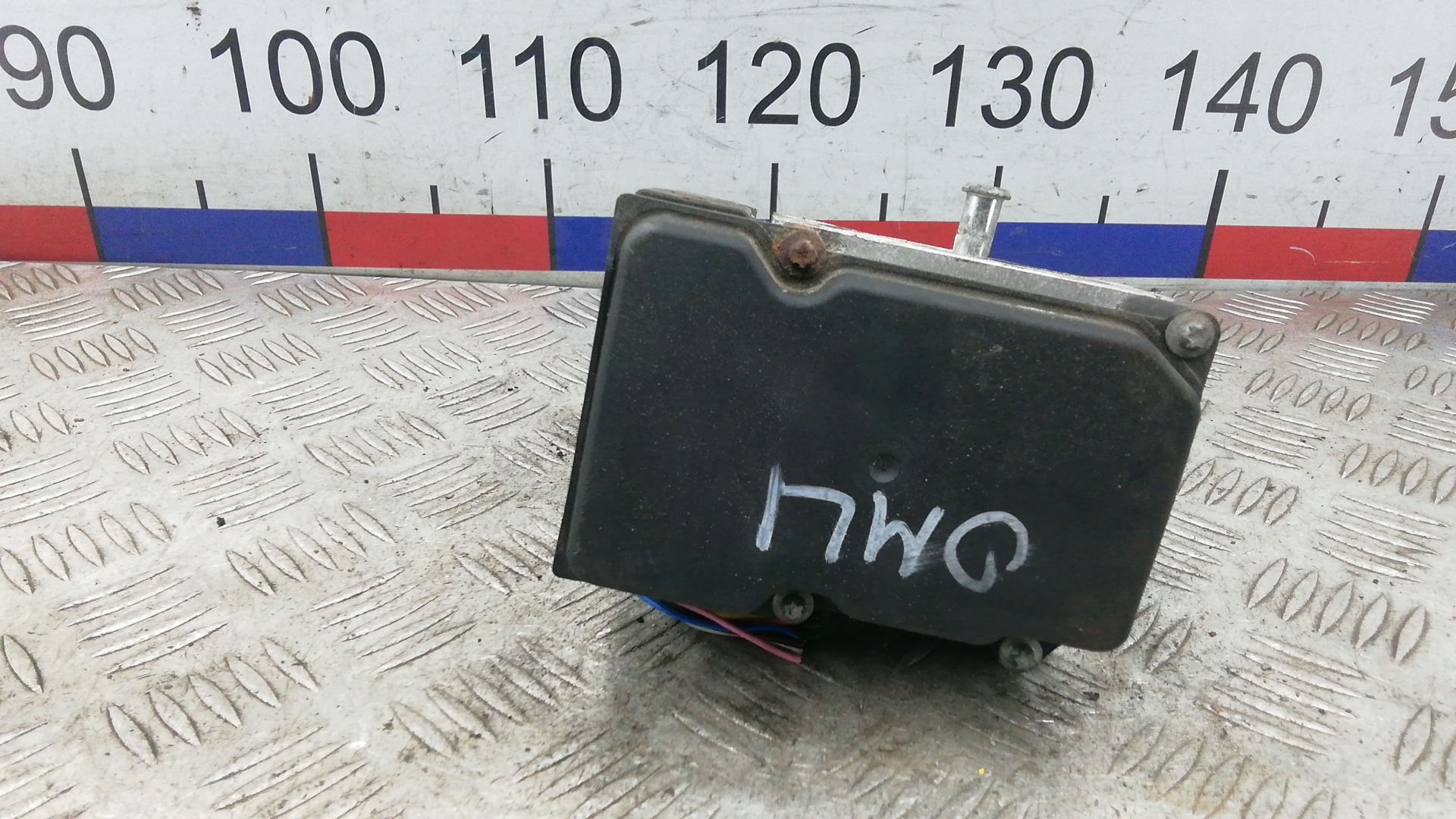 Блок ABS Nissan Almera Tino V10
