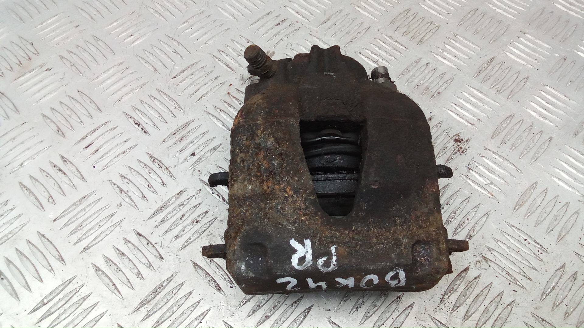 Суппорт тормозной передний правый Skoda Fabia