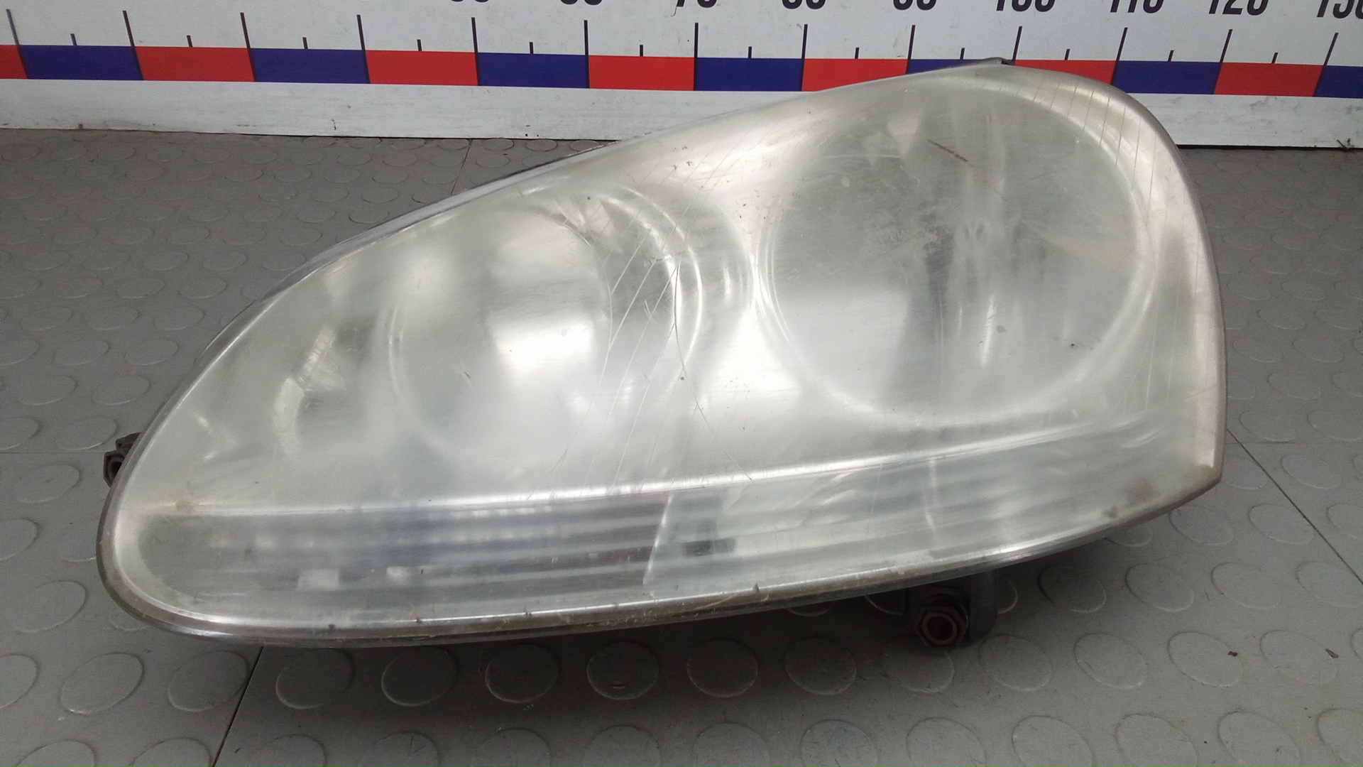 Фара левая Volkswagen Jetta 5