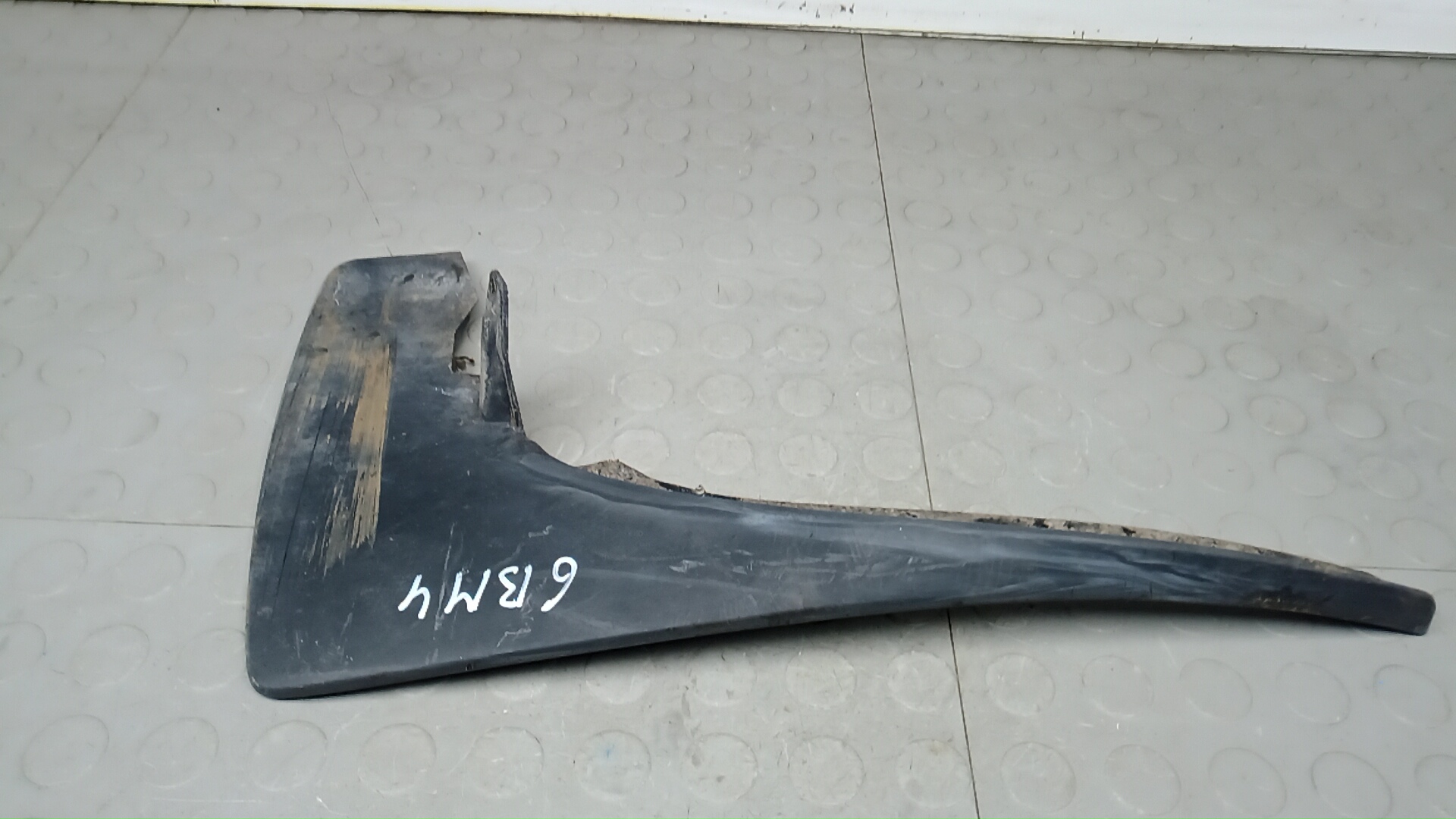 Брызговик Nissan Navara D40
