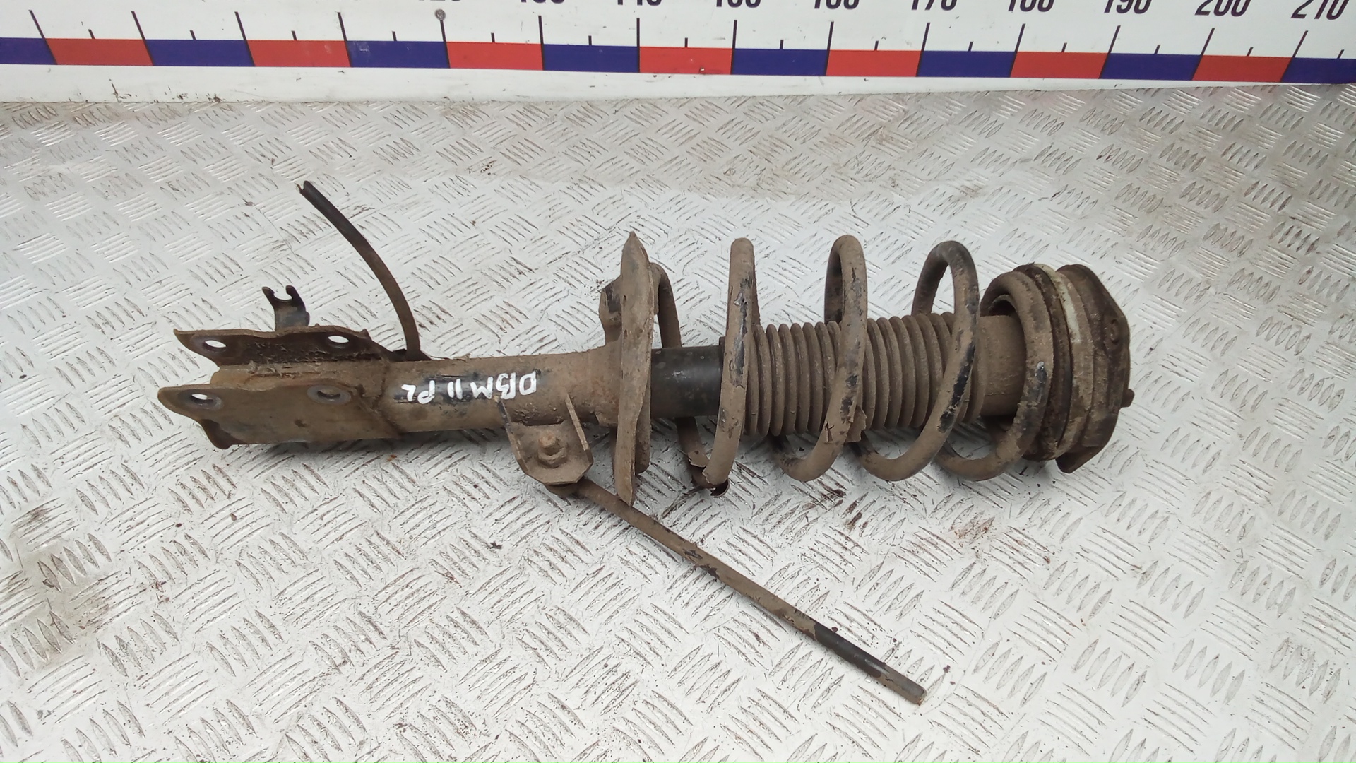 Стойка передняя левая Nissan Qashqai